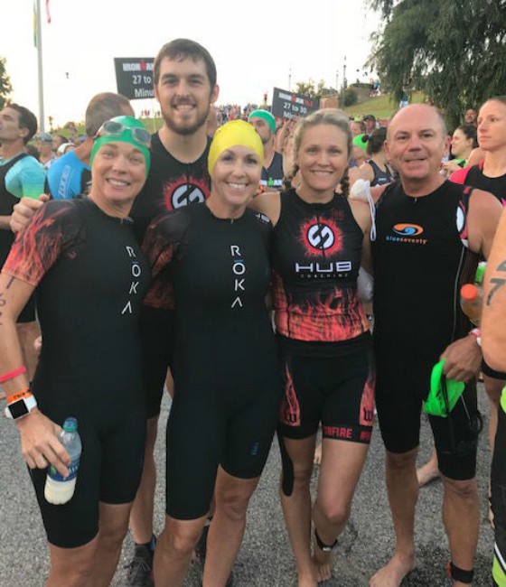 Team Hub group picture in swimming gear.