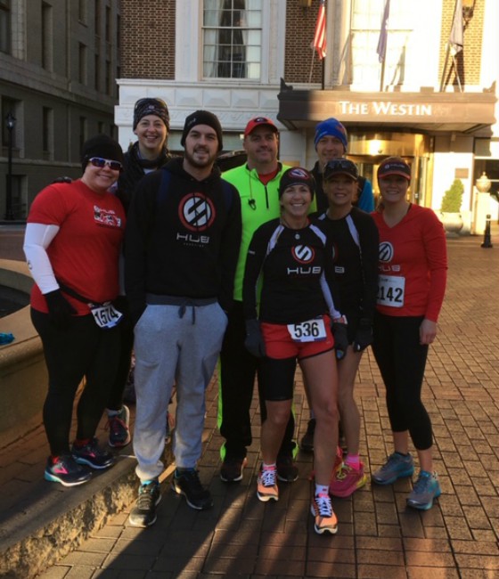 Team Hub group picture downtown greenville before a race.