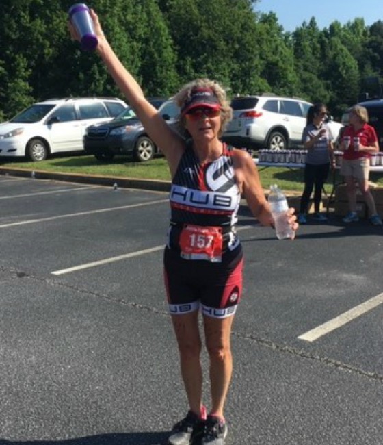 Team Hub member celebrating after a race.