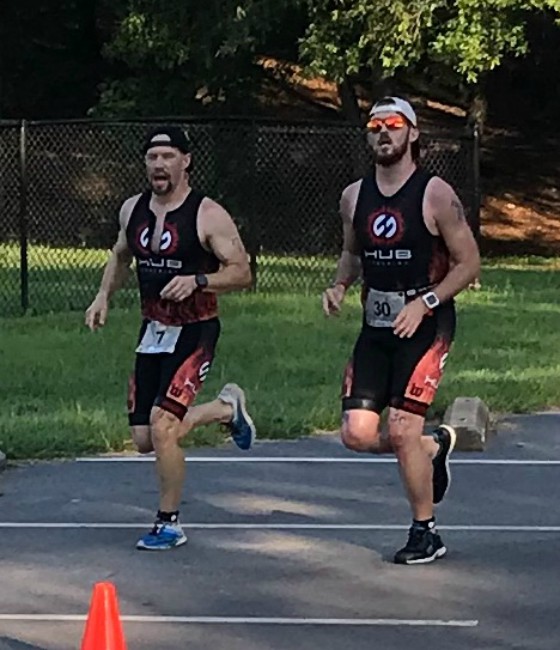 Team Hub members running during a race.
