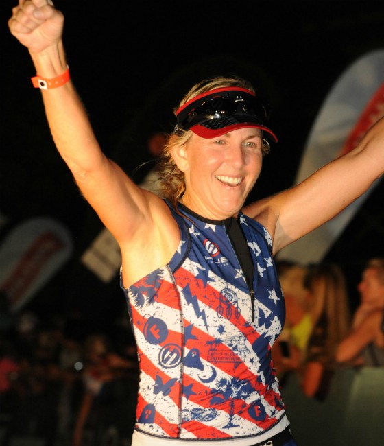 Jennifer after crossing the finish line at IRONMAN Chattanooga.