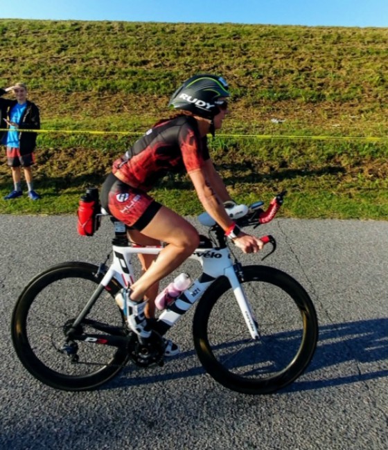 Team Hub member cycling in a race.